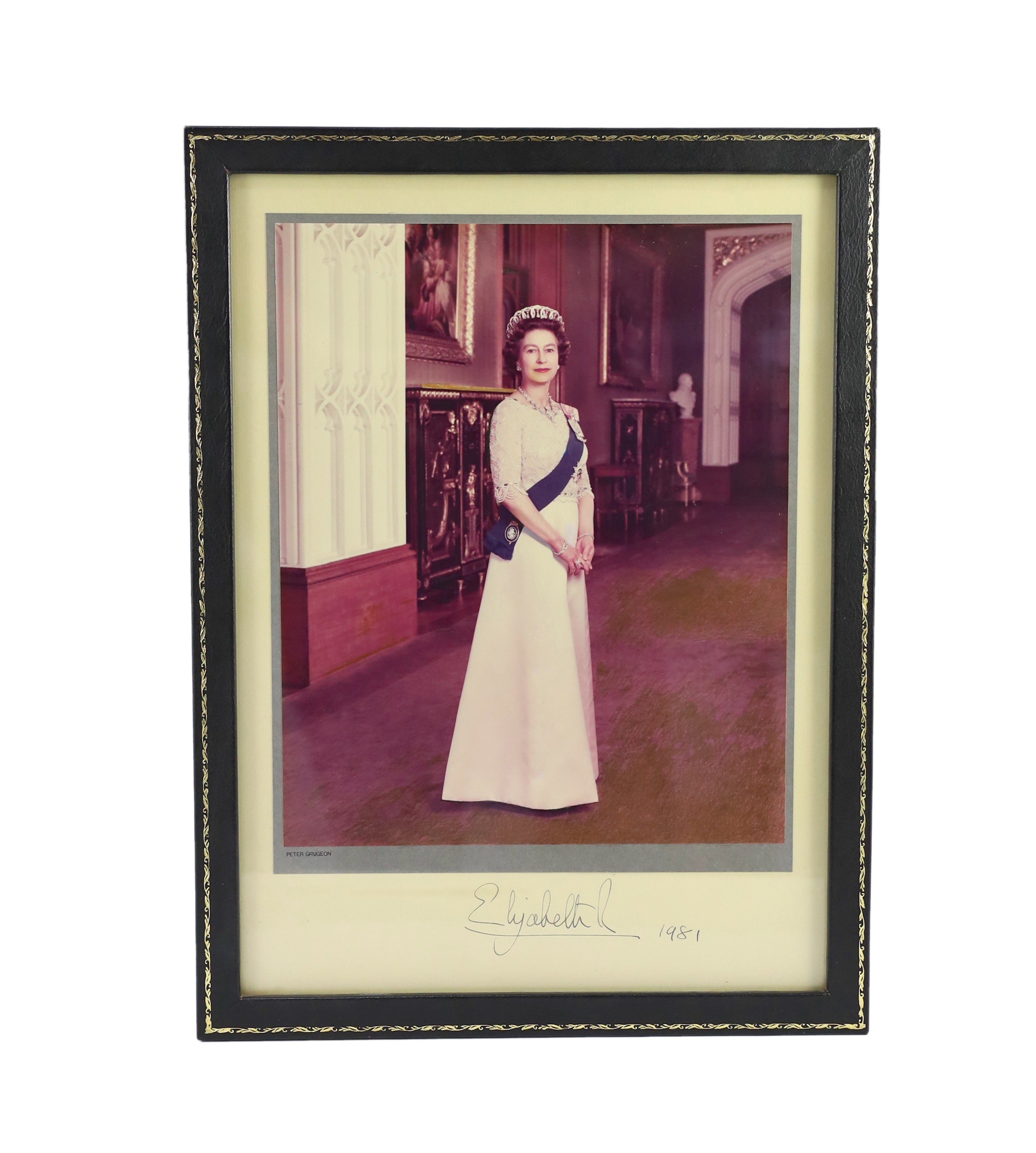 A signed colour photograph of Her Majesty Queen Elizabeth II, the Official Portrait taken by Peter Grugeon for the 1977 Silver Jubilee, signed and dated 1981